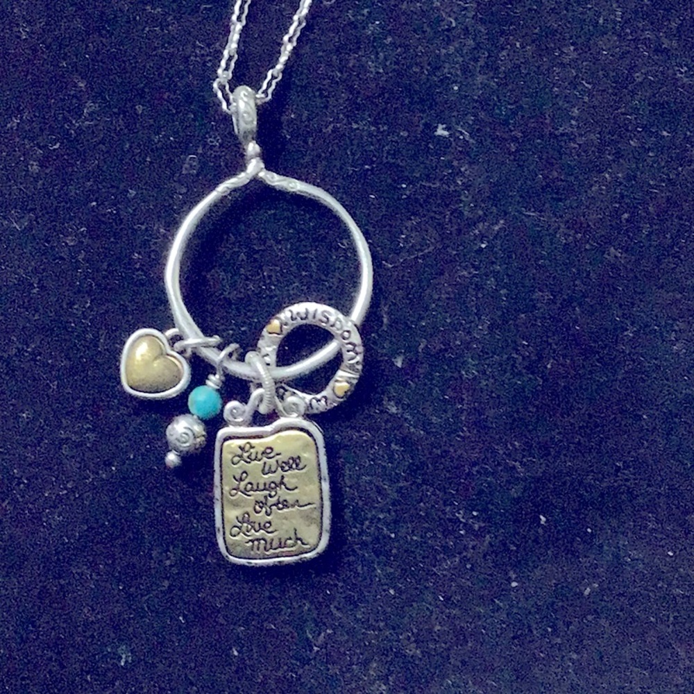 Brighton charm and heart mid length silver and antique bronze necklace.